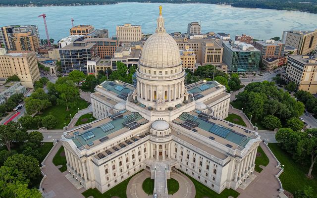 Wisconsin required condo associations to offer owners a dispute conference before suing. New York has no equivalent.